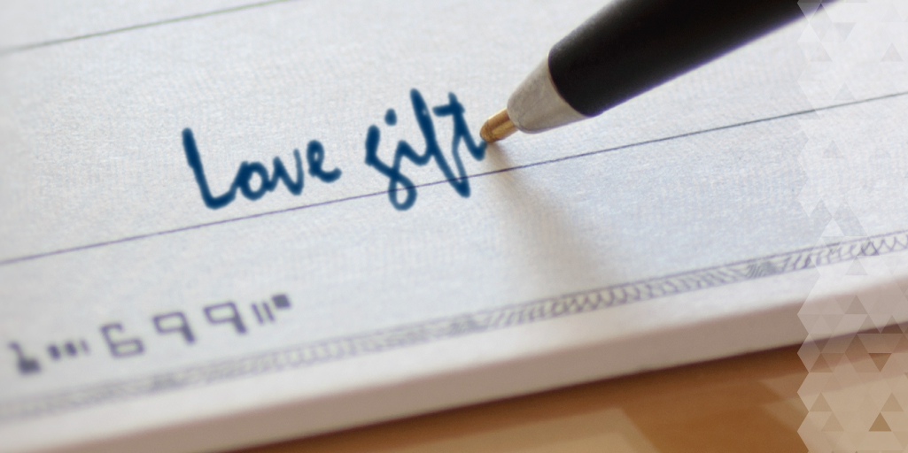 An image of a check with "love note" written in the memo line.