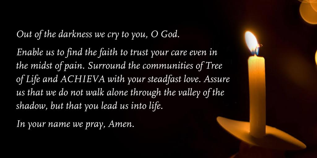 A candle against a dark backdrop with the words: Out of the darkness we cry to you, O God. Enable us to find the faith to trust your care even in the midst of pain. Surround the communities of Tree of Life and ACHIEVA with your steadfast love. Assure us that we do not walk alone through the valley of the shadow, but that you lead us into life. In your name we pray, Amen.