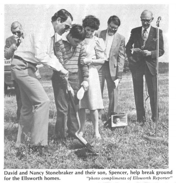 David and Nancy Stonebraker and their son, Spencer, help break ground for the Ellsworth homes.